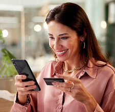 happy woman with credit card