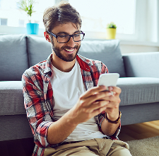 happy young man with phone