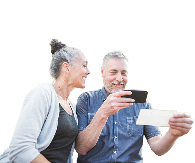 Older couple making mobile deposit